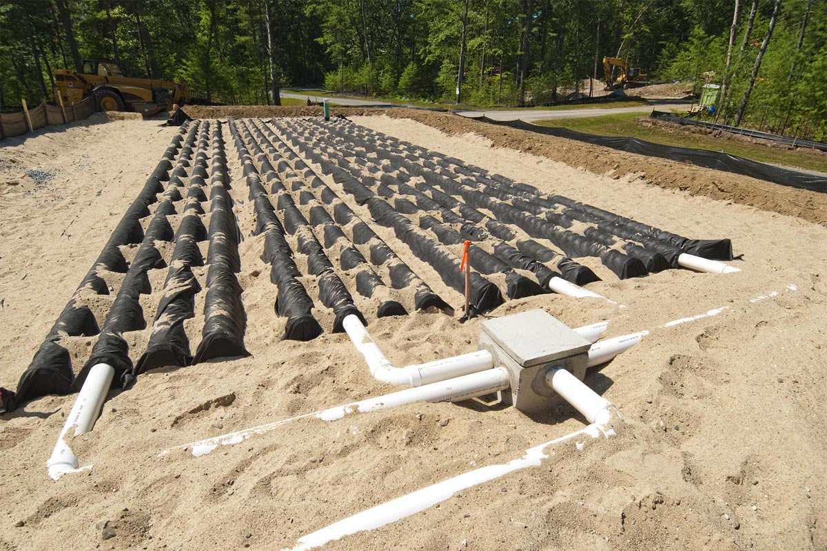 Drainage field installation in progress